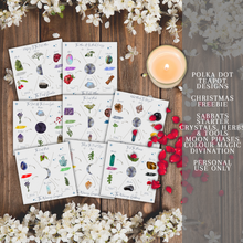 Load image into Gallery viewer, A collection of cards with illustrations of different herbs and crystals that have various meanings and properties. The cards are white with black text and colorful illustrations. The cards are placed on a wooden background with white flowers and a lit candle. The image also has text that says the product is from Polka Dot Designs Teapot Charms &amp; Tools and is for personal use only.
